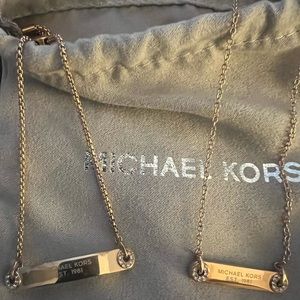 Never worn Michael Kors rose gold necklace and bracelet.